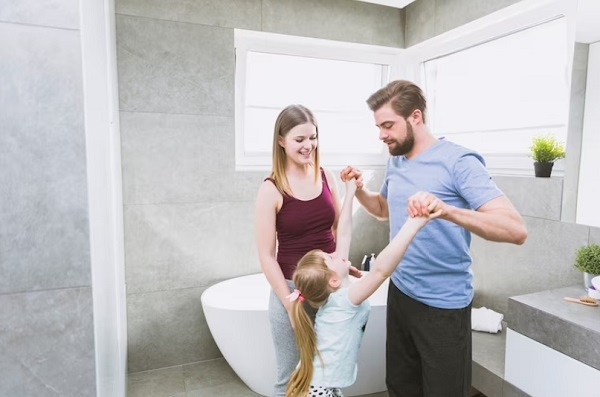 happy family stand on bathroom