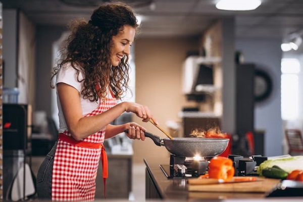woman cooking at home