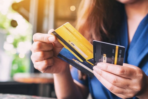 a woman choosing a Credit Card