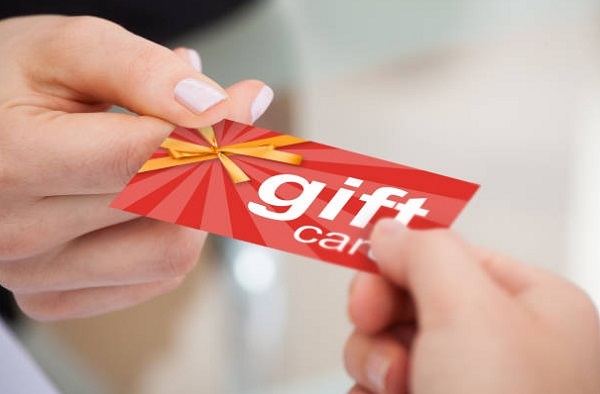two person sharing gift card