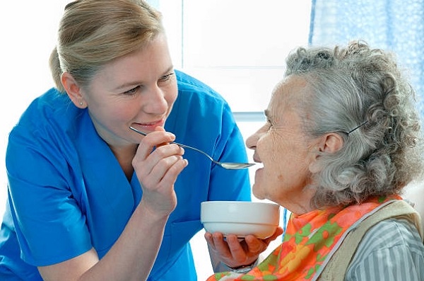 nurse care the old woman