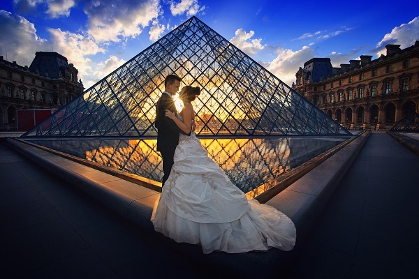 Happy Couple Stand on Paris Spots