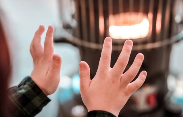 Warming hand from radiator
