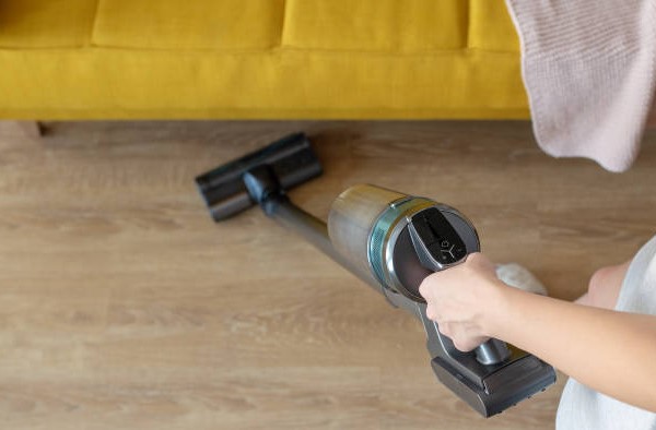 person use cordless vaccume cleaner