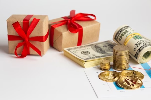 Gift box with coins and cash