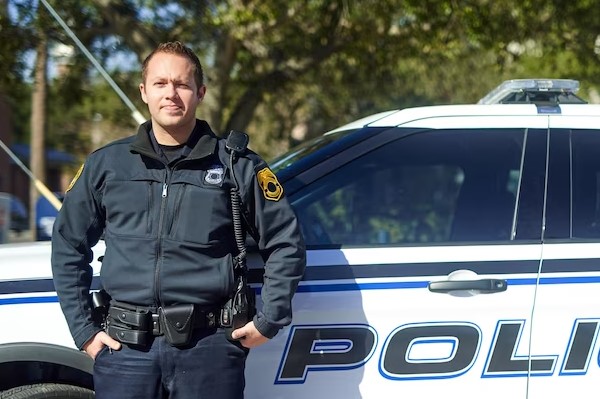 Police officer with his car