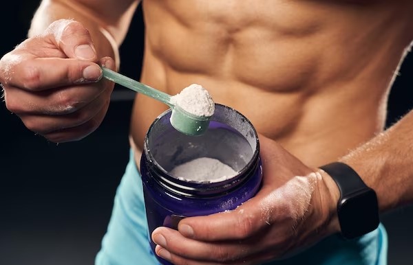 bodybuilder with protien powder