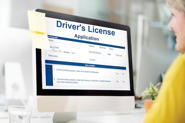 A person fill Driver's License applicatoin