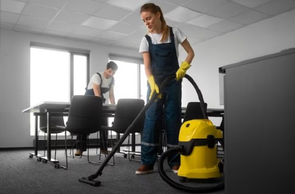 Worker using Vacuum Cleaner