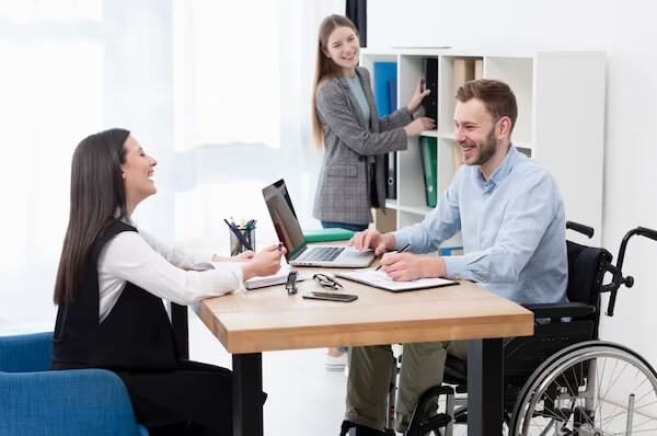 disable person talking to his client