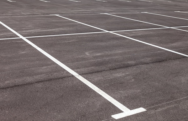 From Grime to Gleam: A Quick Guide to Parking Lot Cleaning