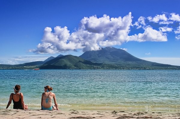 Two Girls Sit a Nevis Island