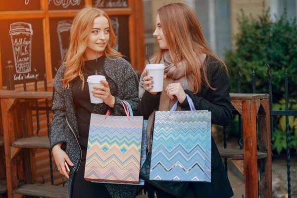 girls holding custom printed bags