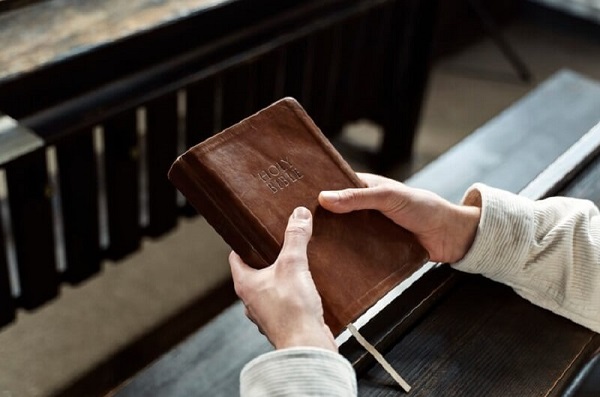 man-holding-bible