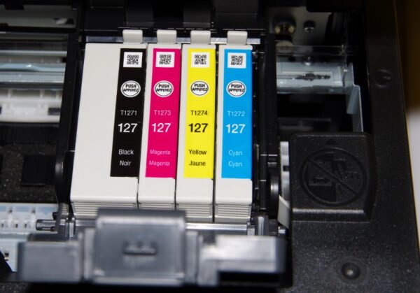 printer ink cartridges in four colors