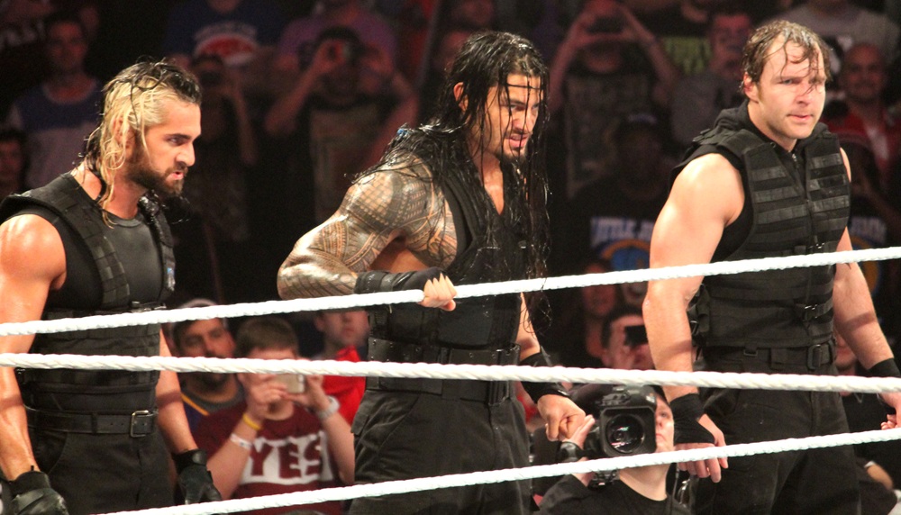 Roman Reigns with other Guys