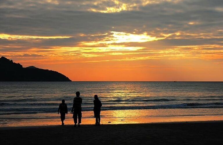 family enjoying on Sydney beach