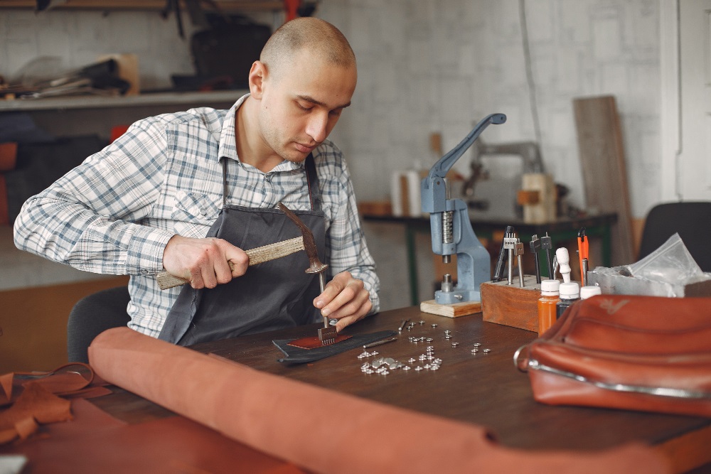 Man Making a Leather Violet