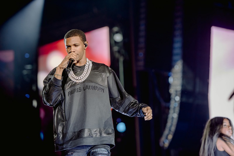 A Boogie Wit Da Hoodie performing on stage in New York City with mic in hand