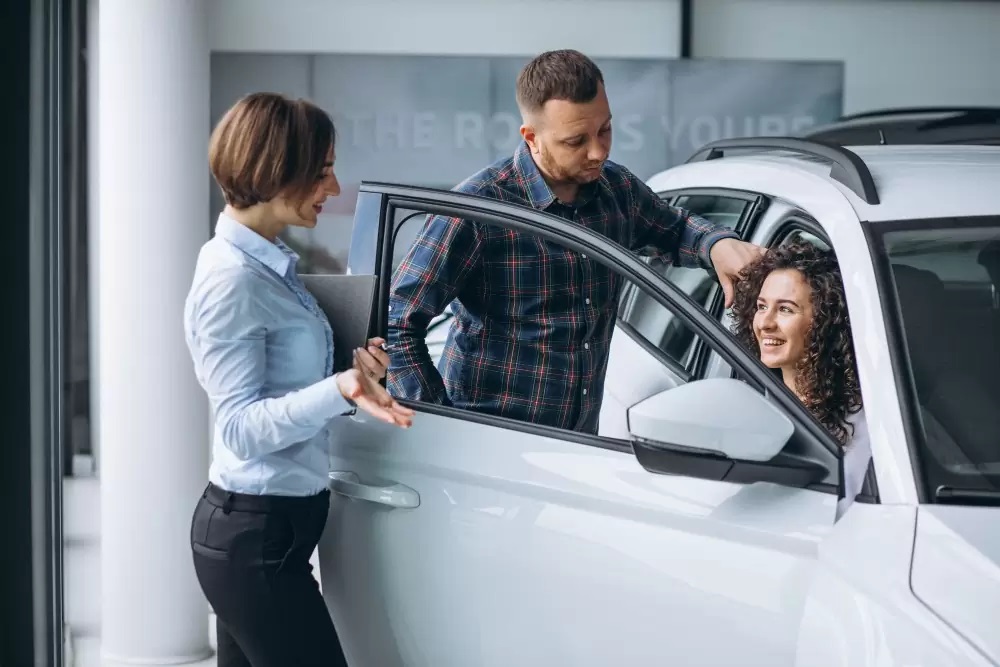 Young Couple check a Rent Car