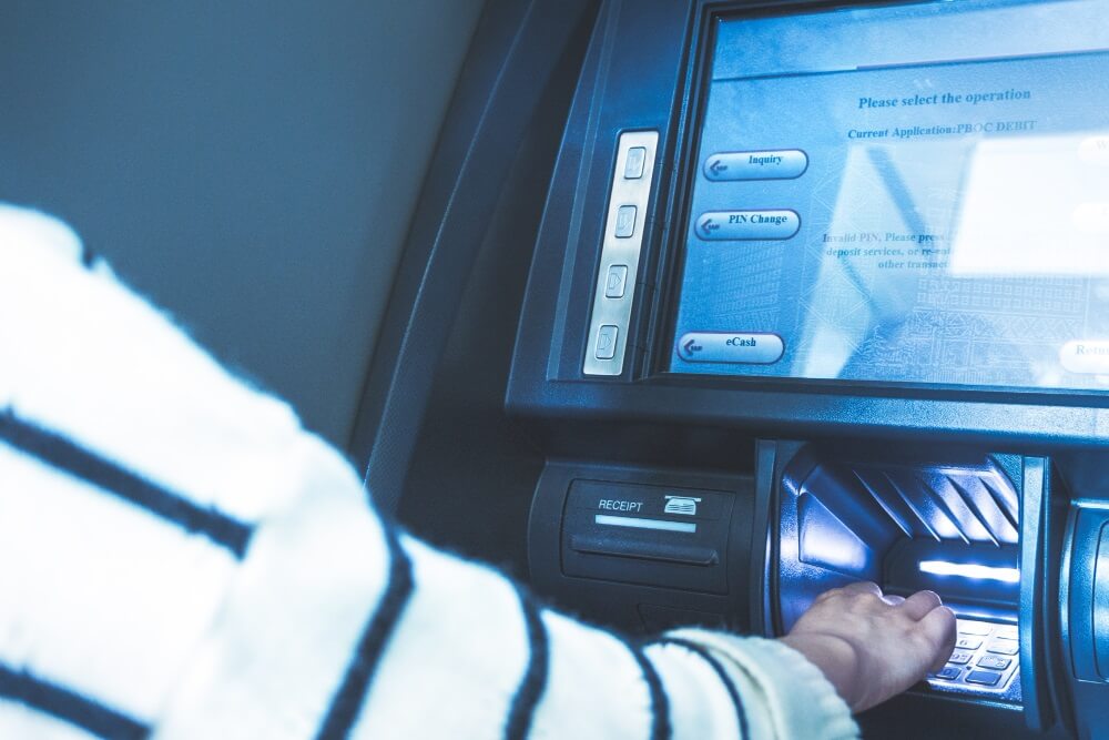 Person-use-Banking-ATMs-Machine