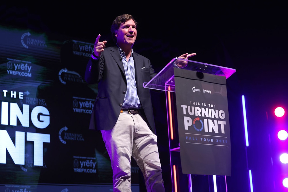 Happy Tucker Carlson